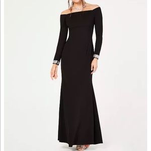 Vince Camuto gown. silver embellished sleeves. new with tags never worn. size 4